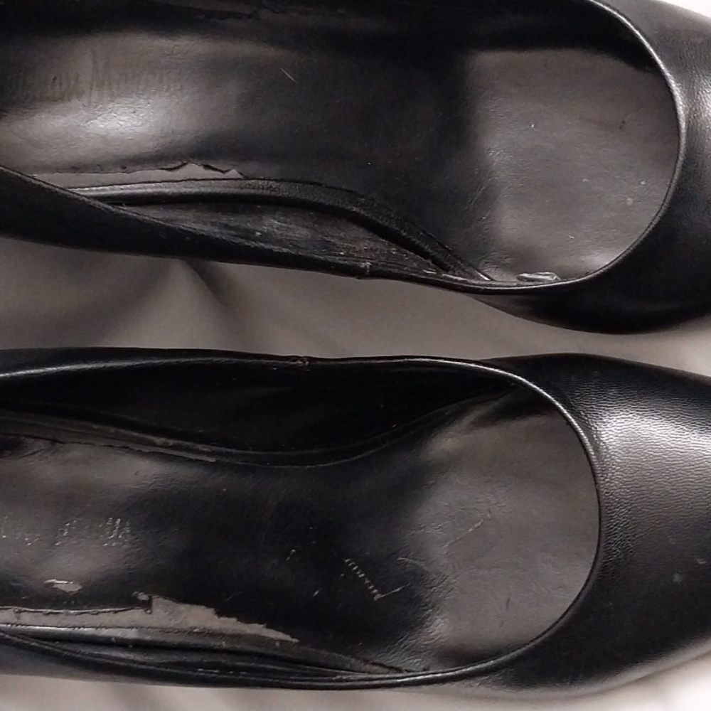 Black leather wedge heel shoes